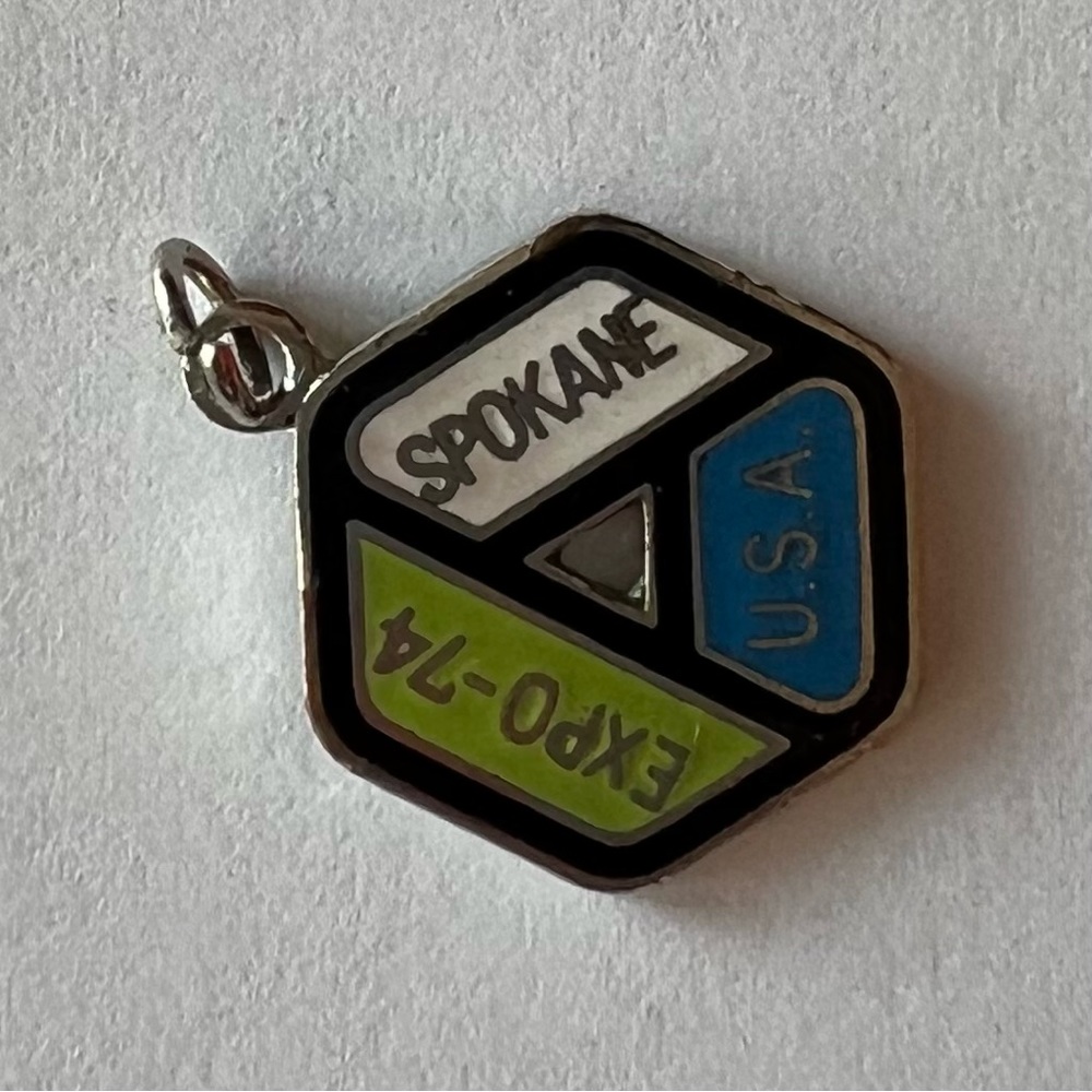 Vintage, silvertone EXPO 74 Spokane charm pendant